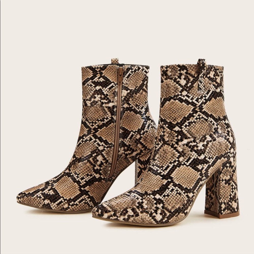 Snake skin heeled boots